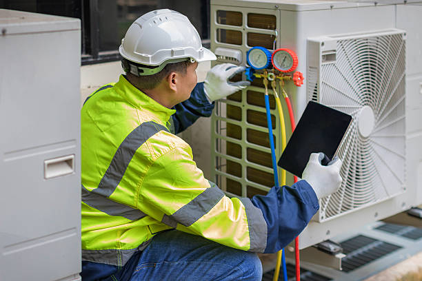 Professional Hvac technician working in Halethorpe, MD